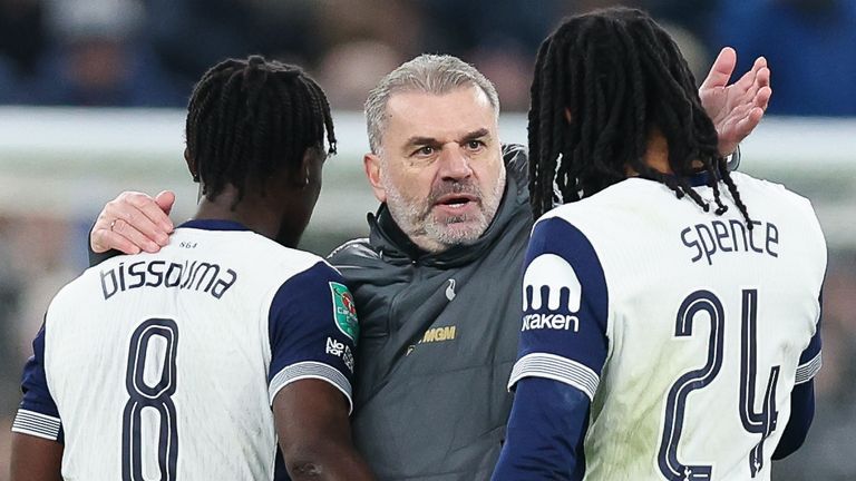 Ange Postecoglou, manager of Tottenham Hotspur, celebrates with Yves Bissouma and Djed Spence 