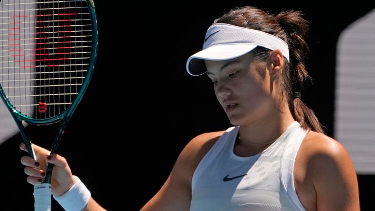 Emma Raducanu of Britain reacts during her third round match against Iga Swiatek of Poland at the Australian Open tennis championship in Melbourne, Australia, Saturday, Jan. 18, 2025. (AP Photo/Asanka Brendon Ratnayake)