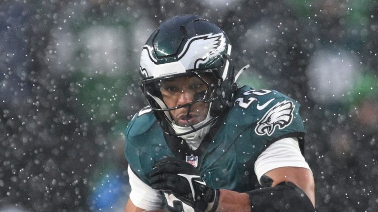 Philadelphia Eagles running back Saquon Barkley runs the ball during the first half of an NFL divisional playoff football game against the Los Angeles Rams, Sunday, Jan. 19, 2025, in Philadelphia. (AP Photo/Terrance Williams)