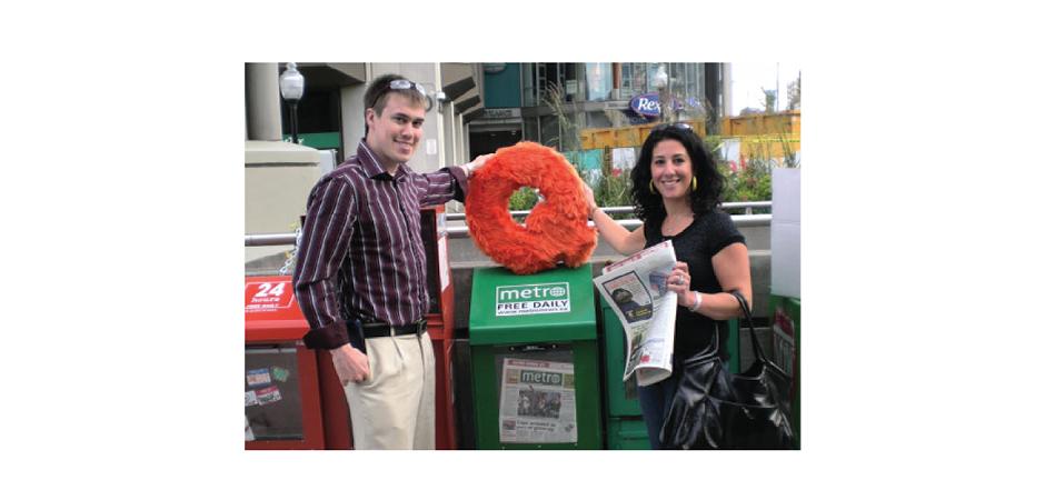 People with Metro News Box and Fuzzy Q